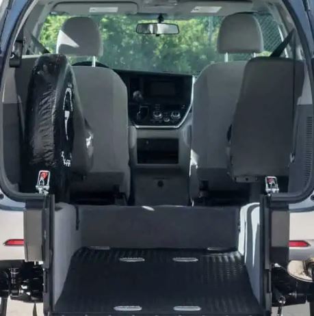 Interior of FR Conversions Toyota Sienna rear-entry wheelchair van showing wheelchair area and flooring