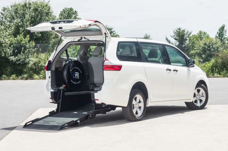 FR Conversions Toyota Sienna rear-entry wheelchair van exterior in white with ramp deployed