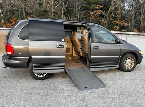 Gray 1998 Chrysler Town & Country Wheelchair Van with Ramp Deployed from passenger sliding door.