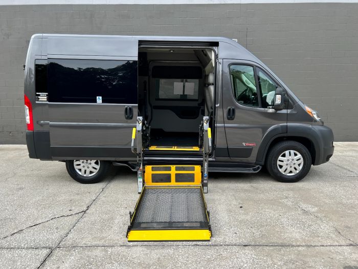 Gray Ram ProMaster Full Size Wheelchair Van with Tempest X-HT Conversion with lift deployed