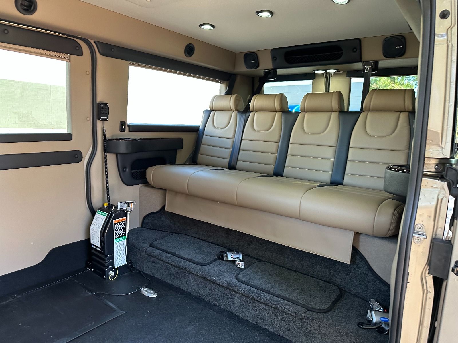 Interior and rear bench seat of RAM ProMaster with Tempest X Wheelchair Van Conversion