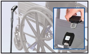 Image showing a rigid seat belt extension standing upright next to a wheelchair.